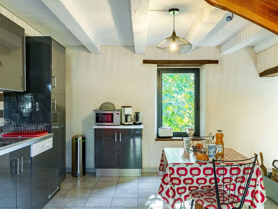 Furniture, Property, Cabinetry, Countertop, Kitchen, Interior Design, Table, Wood, Living Room, Flooring