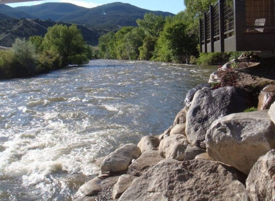 Fish from the balcony or from the rocky shore below, or from the riverwalk public access throughout town