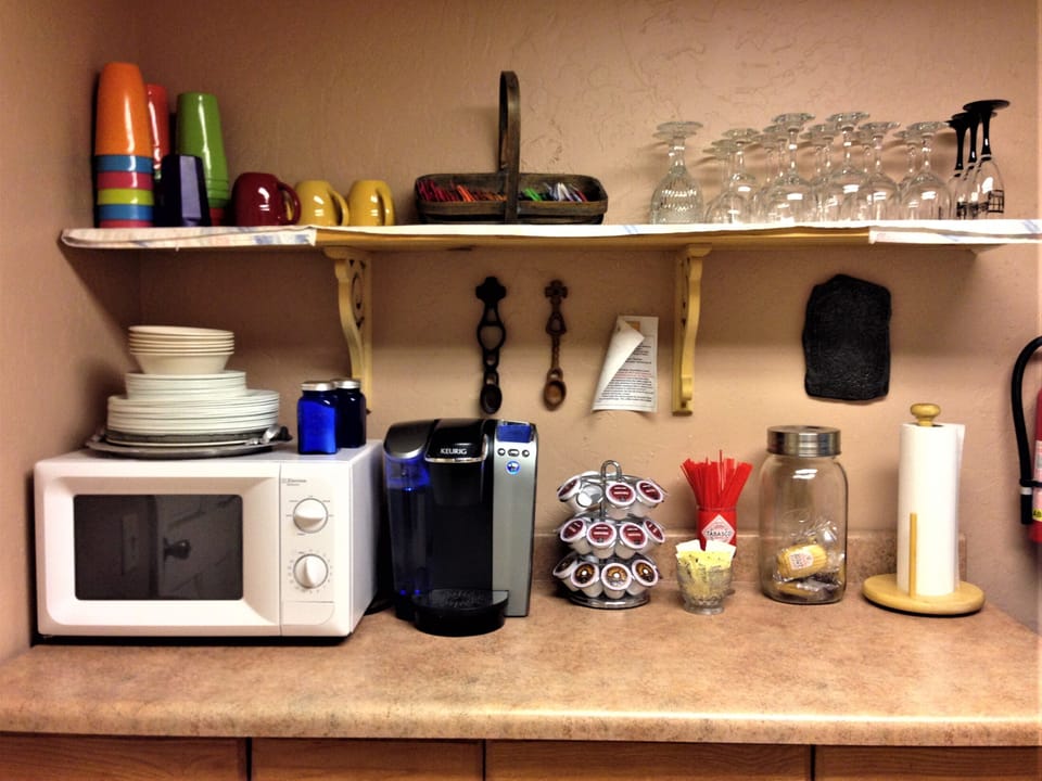Shared fridge, microwave, electric kettle, cookware/dishes/utensils