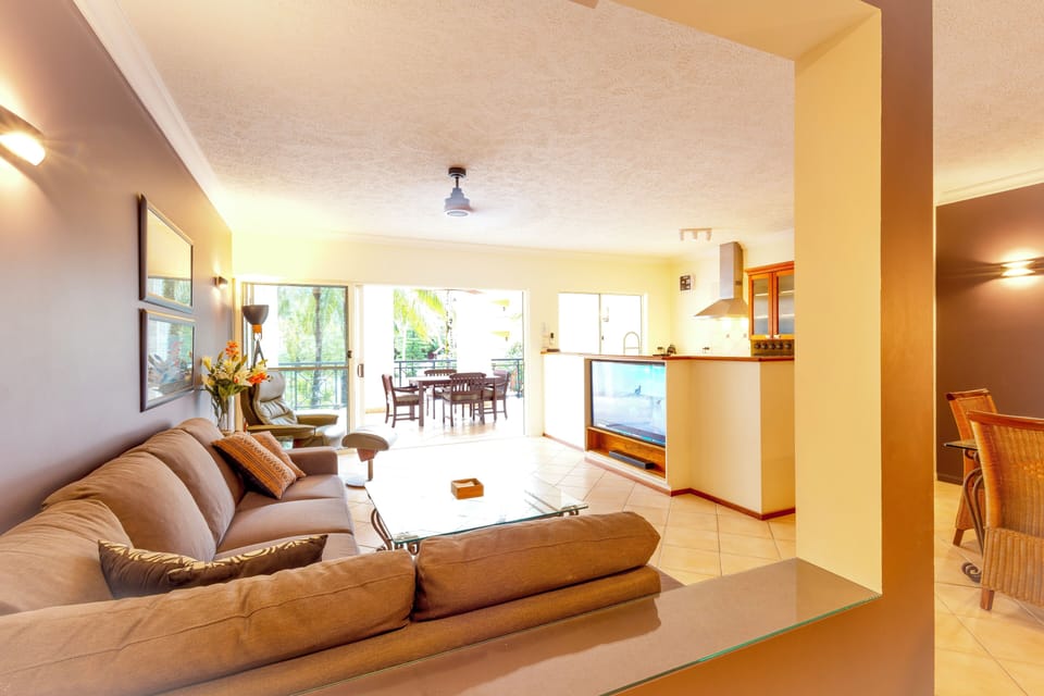 Spacious living flows to dining balcony (≈166 m² home at The Lakes)