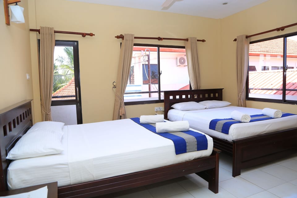 Family Room | Premium bedding, in-room safe, desk, blackout drapes