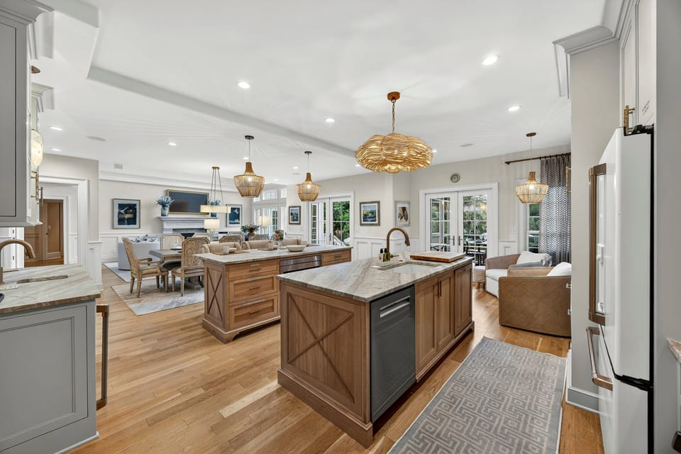 Fully equipped kitchen with with bar stools, wine fridge, and plenty of space for cooking!