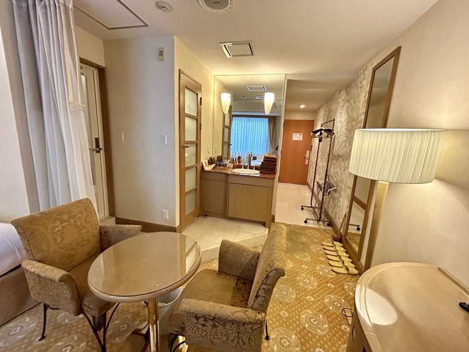 Triple Room | Bathroom | Free toiletries, hair dryer, slippers, electronic bidet