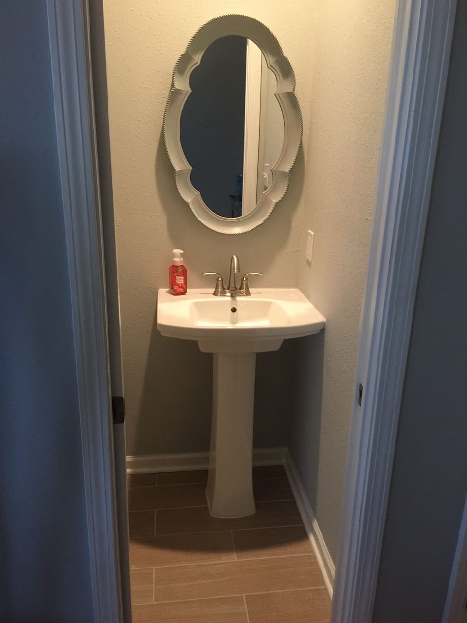 1 of 2 half baths (on each level) this makes 4 toilets/sinks total for families 