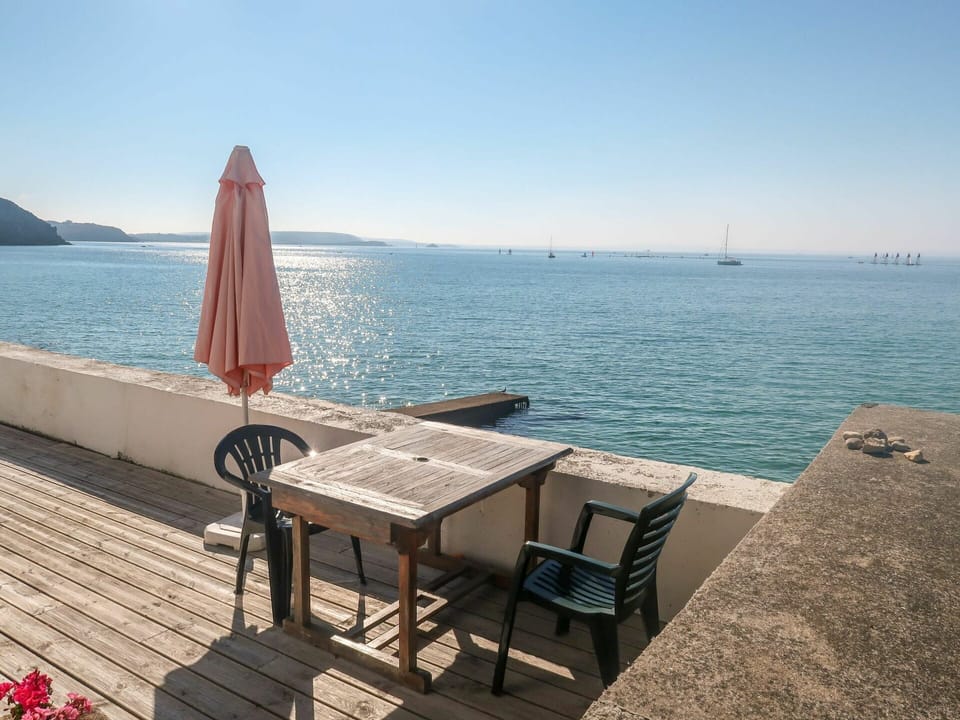 Water, Sky, Table, Furniture, Azure, Plant, Outdoor Furniture, Wood, Outdoor Table, Chair
