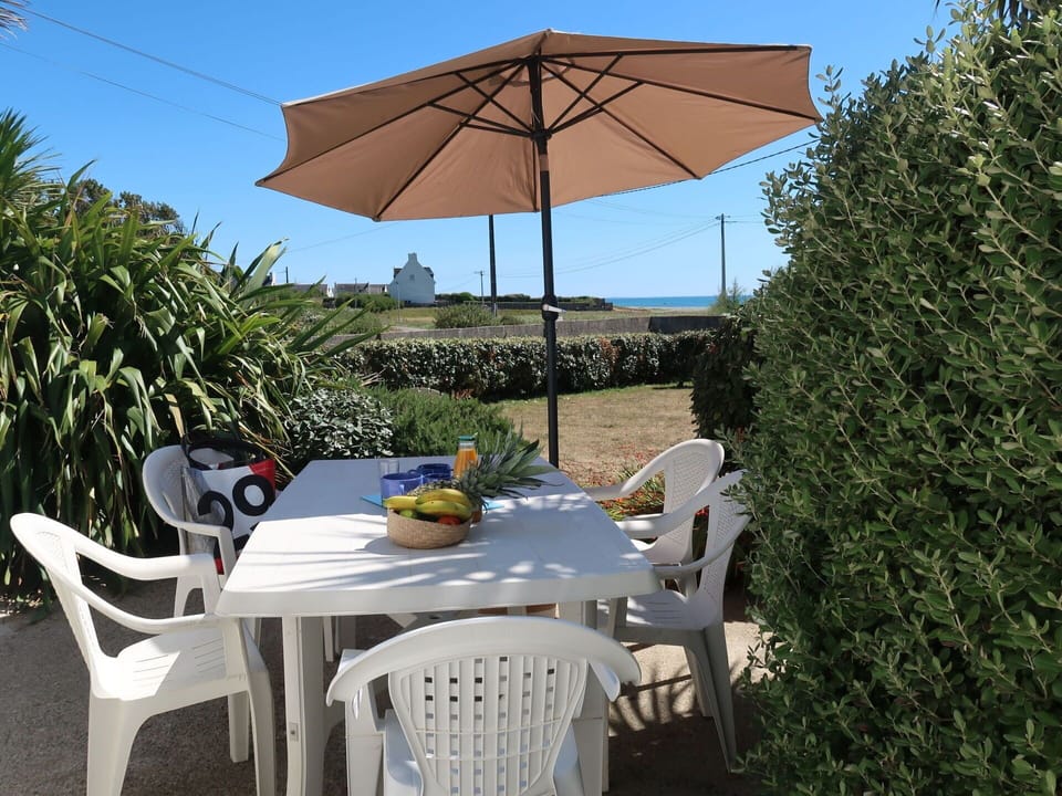 Table, Furniture, Sky, Property, Umbrella, Chair, Plant, Building, Outdoor Table, Azure