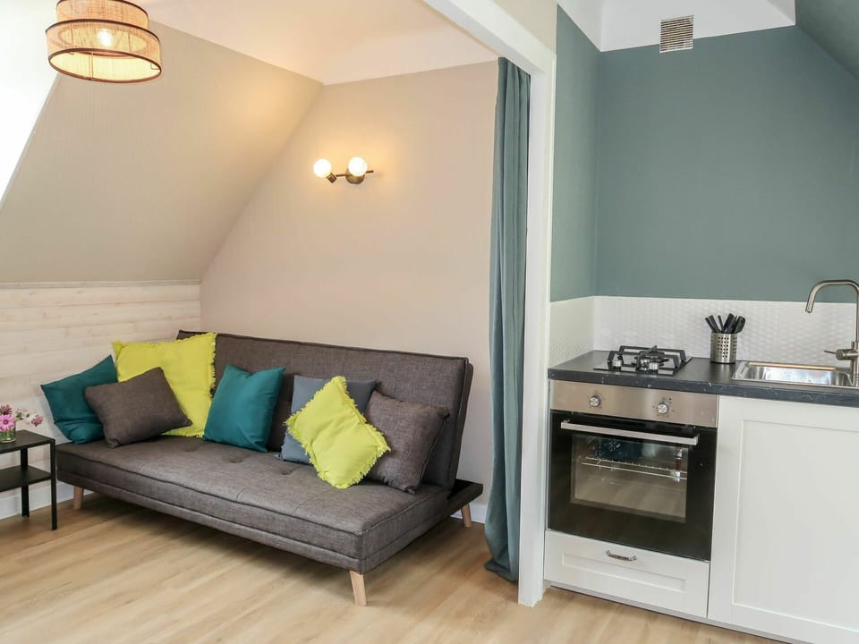 Furniture, Building, Couch, Cabinetry, Sink, Green, Wood, Comfort, Interior Design, Lighting