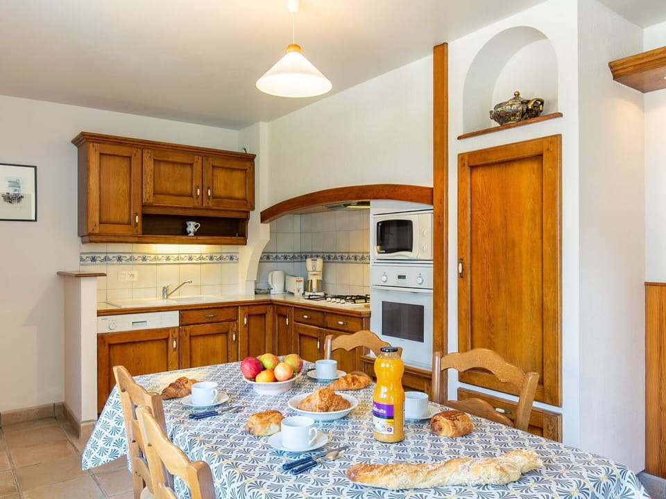 Cabinetry, Furniture, Property, Countertop, Table, Blue, Wood, Interior Design, Lighting, Chair