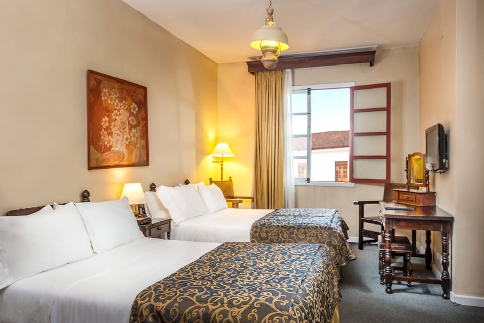 Standard Quadruple Room, 2 Bedrooms | Premium bedding, minibar, in-room safe, desk