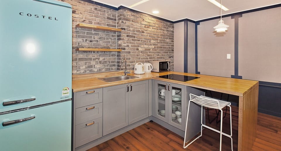 Classic Room | Private kitchenette | Full-size fridge, microwave, stovetop, electric kettle