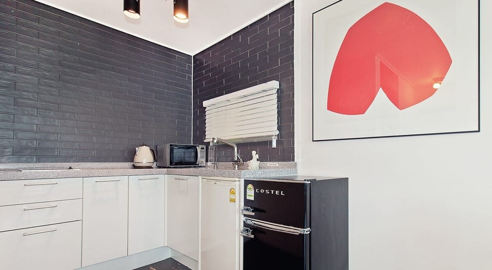 Nordic Room | Private kitchenette | Full-size fridge, microwave, stovetop, electric kettle