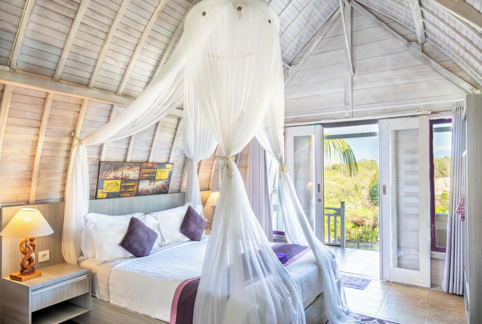 Deluxe Double Room with Garden View | Minibar, in-room safe, desk, soundproofing