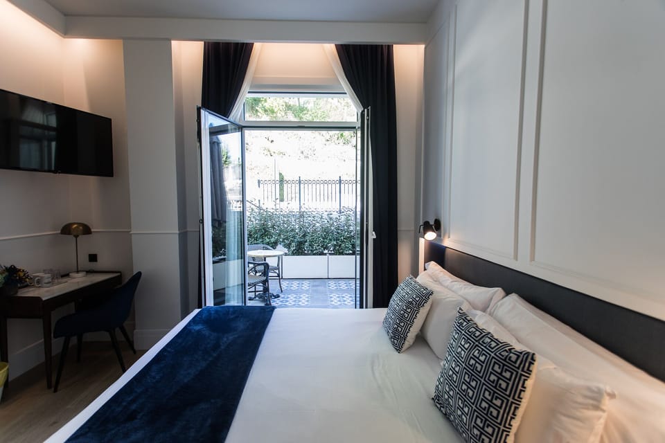 Double Room, Terrace | Free minibar, in-room safe, desk, laptop workspace