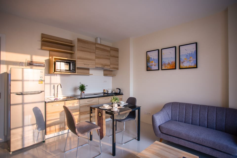 Superior Apartment, 1 Bedroom | Living area | 40-inch Smart TV with cable channels, TV, fireplace