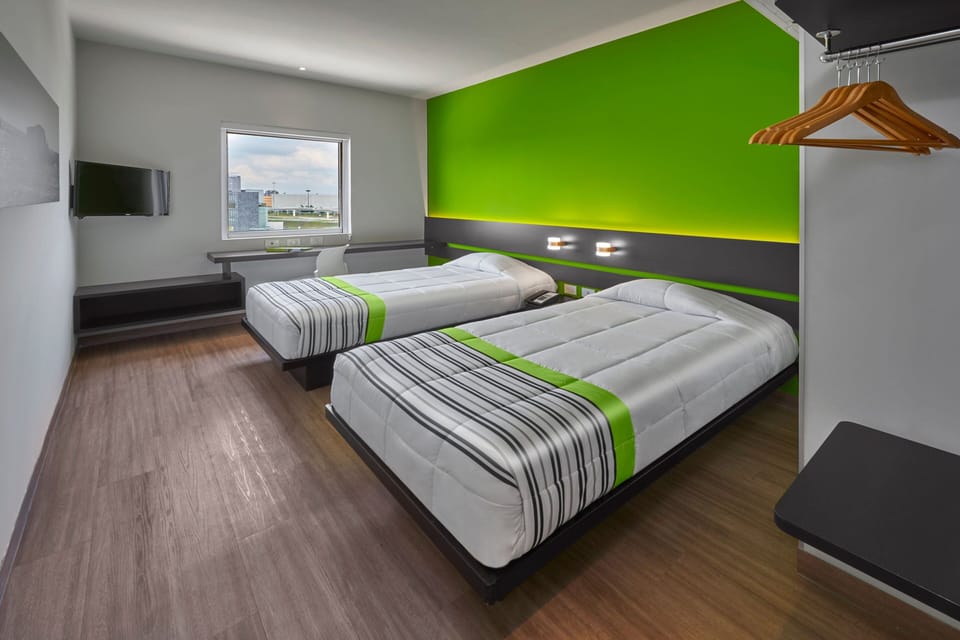 Room, 2 Twin Beds | Down comforters, in-room safe, desk, blackout drapes