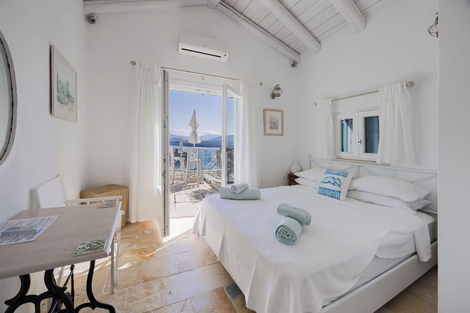 Main bedroom opening onto patio with stunning view
