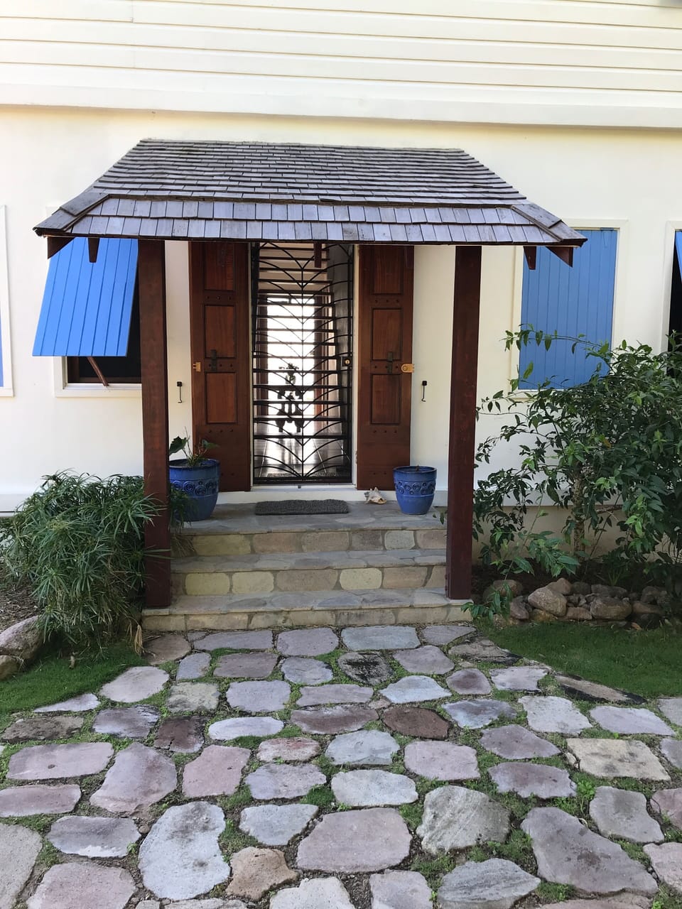 FRONT DOOR ENTRANCE WITH OVERHANG FOR RAIN 