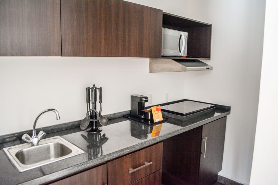 Mini-fridge, microwave, cookware/dishes/utensils