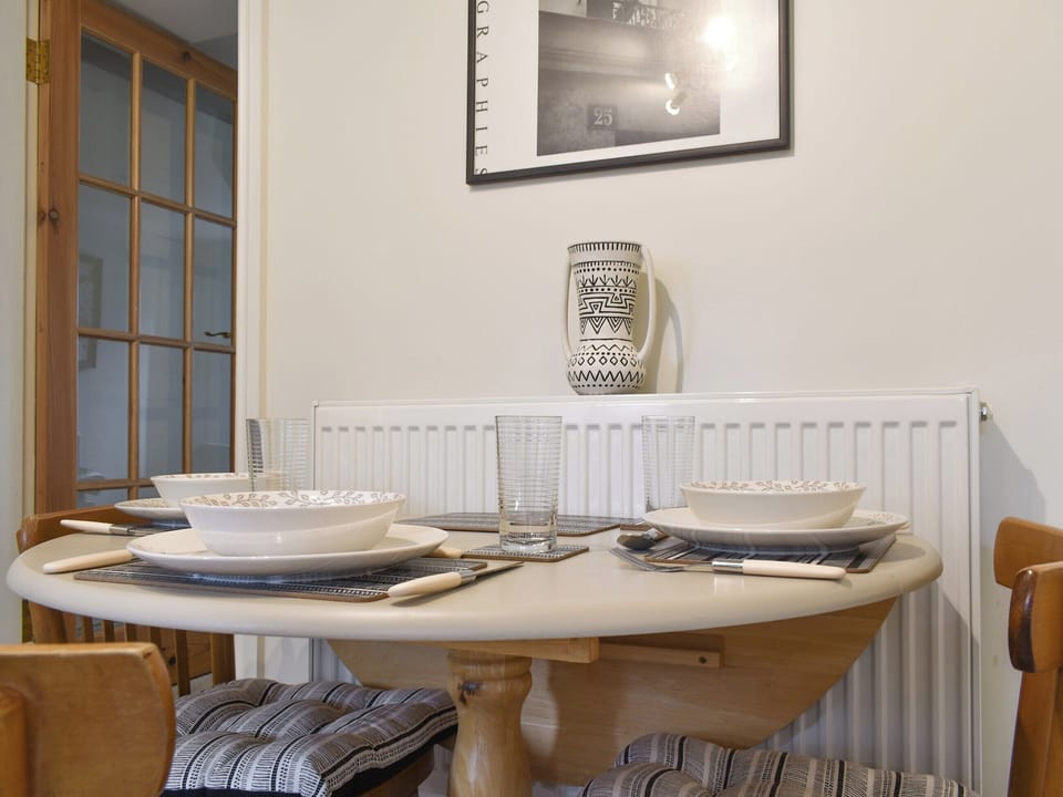 Intimate dining area within the kitchen | Millys Nook, St Austell