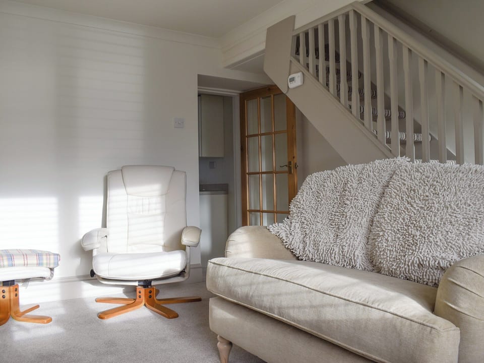Comfortable seating within living room | Millys Nook, St Austell