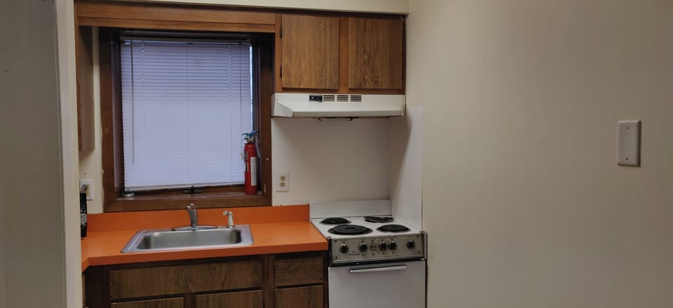 Signature Room | Private kitchen | Fridge, microwave