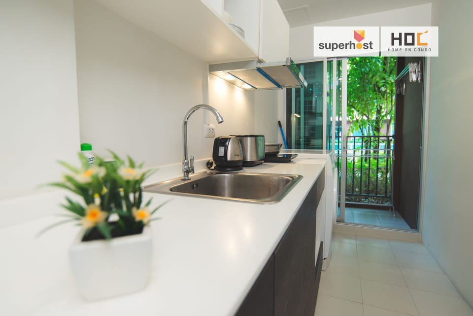 Luxury Condo, Pool View | Private kitchen | Full-size fridge, microwave, stovetop, electric kettle