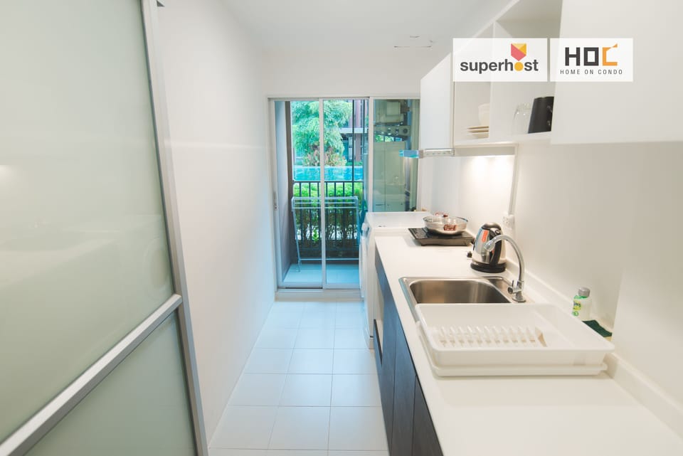 Luxury Condo, Pool View | Private kitchen | Full-size fridge, microwave, stovetop, electric kettle