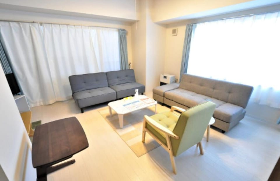 1 Bedroom Apartment | Living room | Flat-screen TV