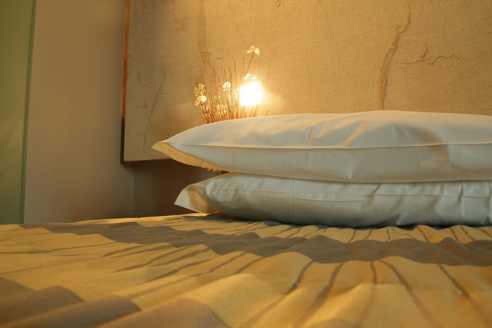 Desk, laptop workspace, blackout drapes, soundproofing