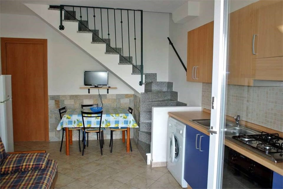 Classic Apartment, Kitchenette | Private kitchenette | Full-size fridge, stovetop, cookware/dishes/utensils