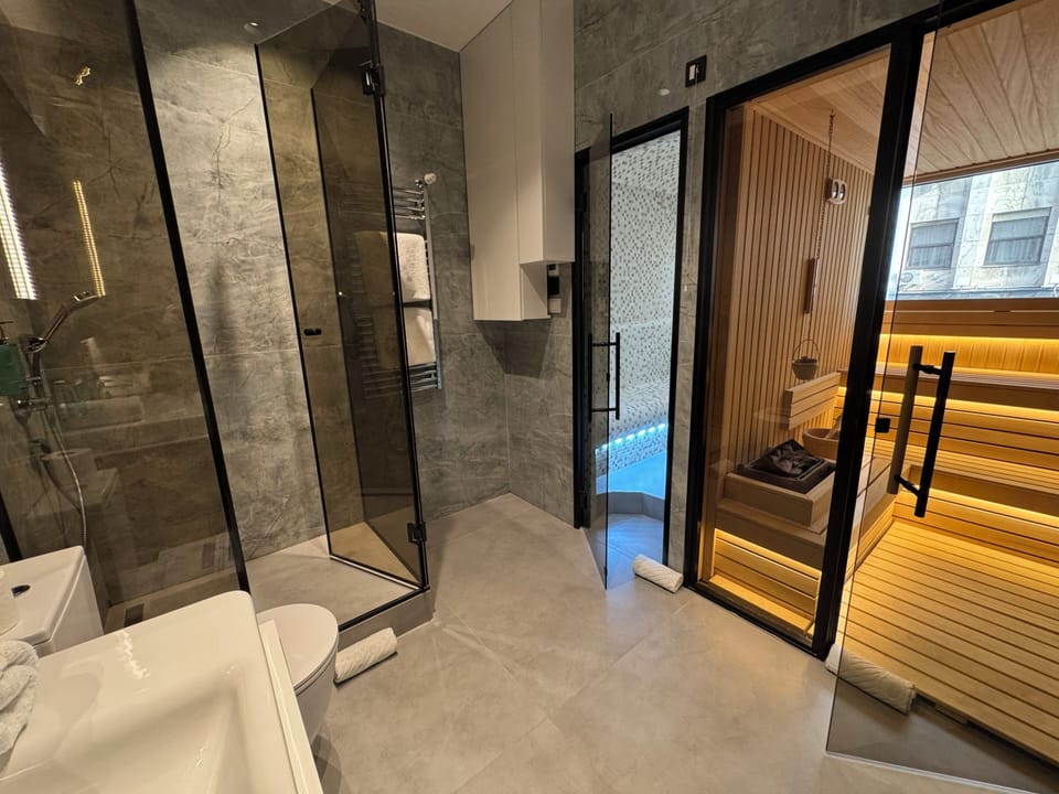 Superior Apartment, 1 Bedroom, Sauna | Bathroom | Free toiletries, hair dryer, bathrobes, slippers