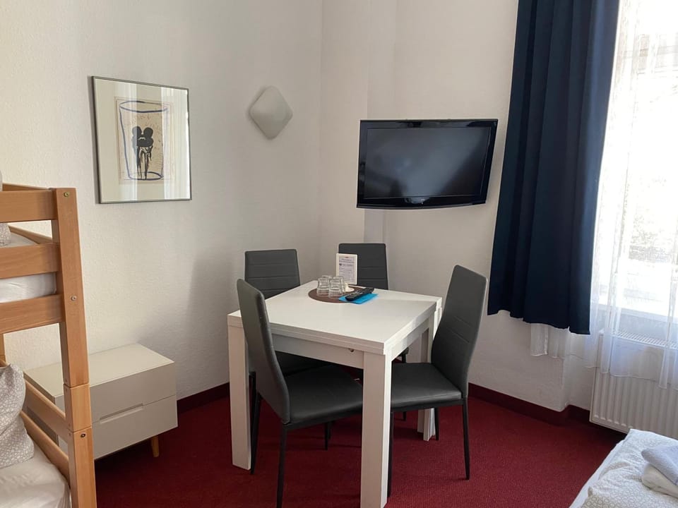 Quadruple Room | Desk, blackout drapes, iron/ironing board, free cribs/infant beds