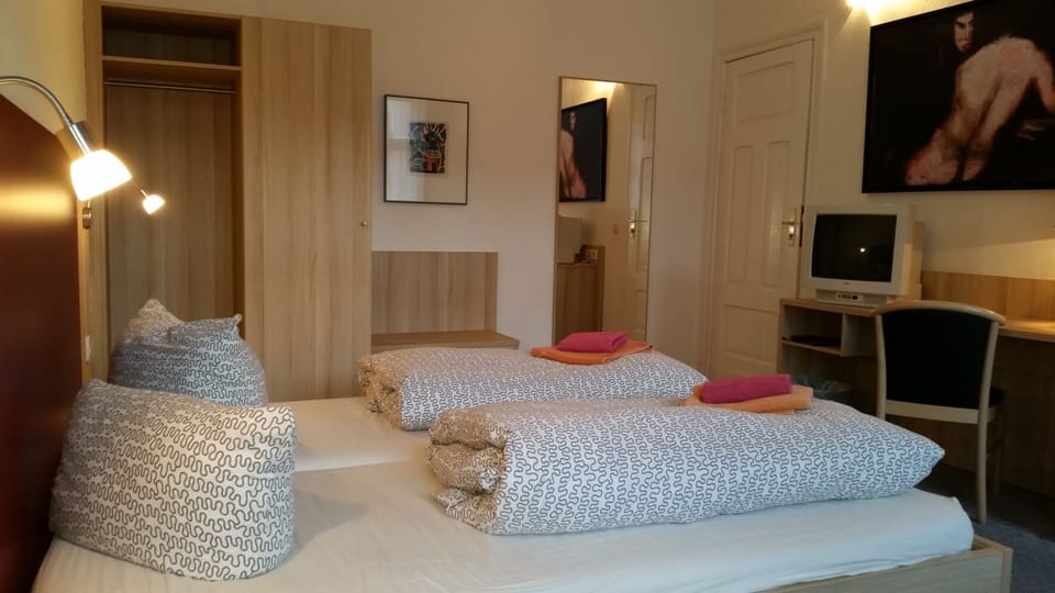 Double Room | Desk, blackout drapes, iron/ironing board, free cribs/infant beds