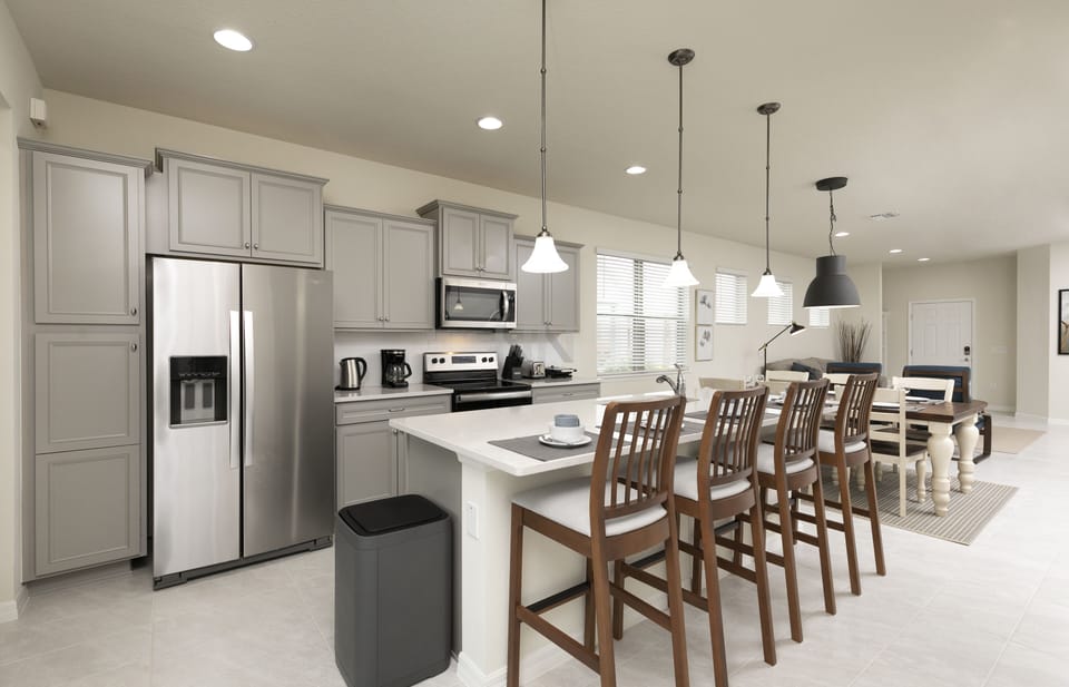 Cook and chat in our spacious kitchen with 4 stools!