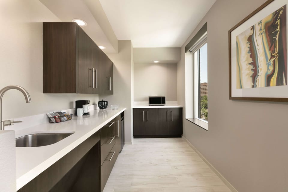 Suite, 1 King with Sofa bed (Accessible Room with Shower) | Desk, blackout drapes, soundproofing, iron/ironing board