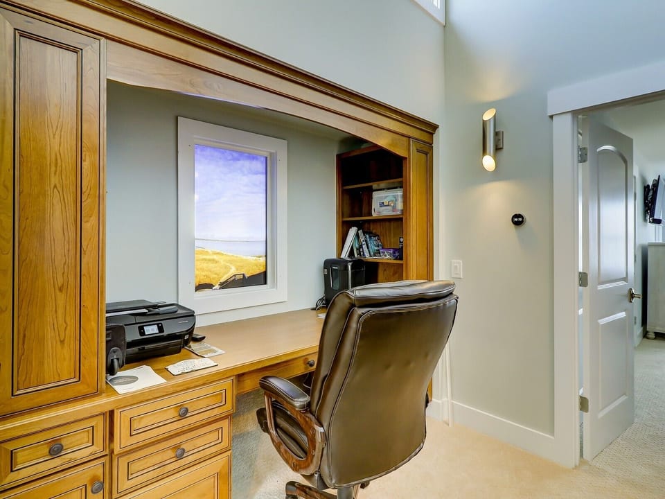 Upstairs Office Features Picture Window with Live Camera Views of Calibogue Sound