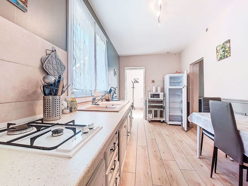 Kitchen, Countertop, Flooring, Interior Design, Furniture, Kitchen Appliance, Major Appliance, Wood, Floor, Cabinetry