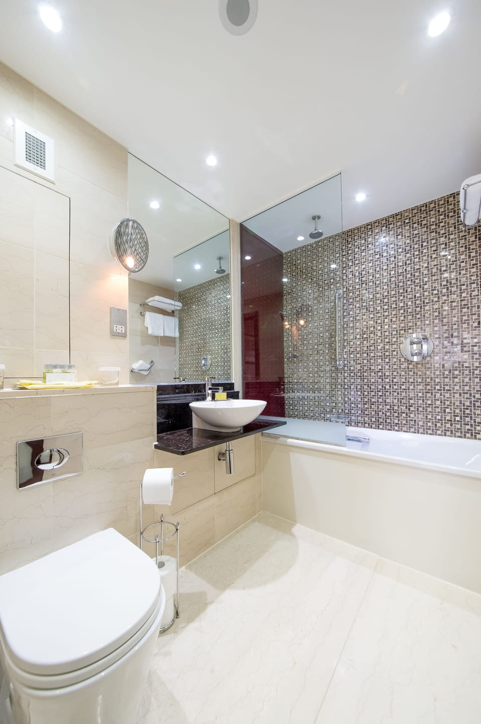 Junior Suite, 1 Queen Bed (Duplex, Living Room) | Bathroom | Combined shower/tub, rainfall showerhead, free toiletries, hair dryer