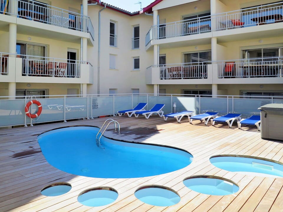Property, Window, Building, Water, Swimming Pool, Azure, Architecture, Outdoor Furniture, Urban Design, Floor