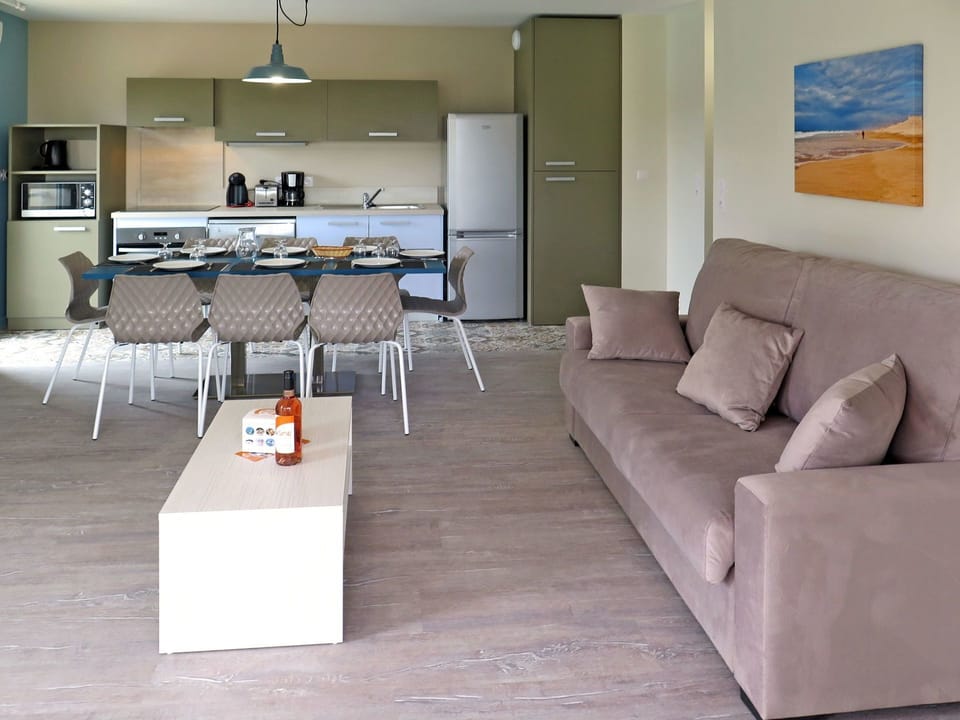 Furniture, Living Room, Room, Floor, Property, Interior Design, Table, Coffee Table, Flooring, Building
