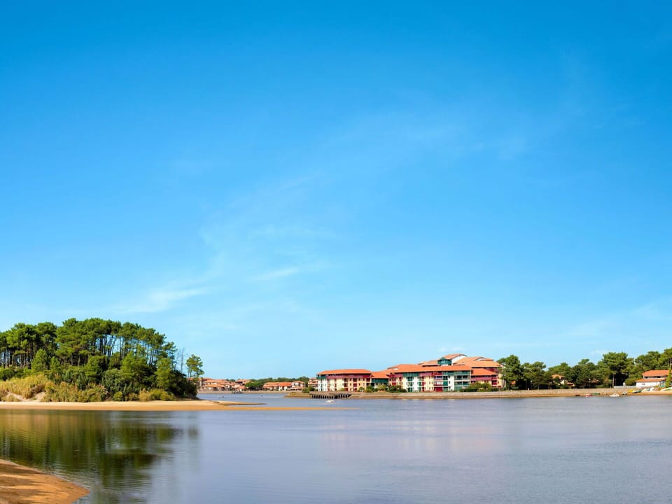 Sky, Body Of Water, Water, Blue, Water Resources, Daytime, River, Waterway, Cloud, Bank