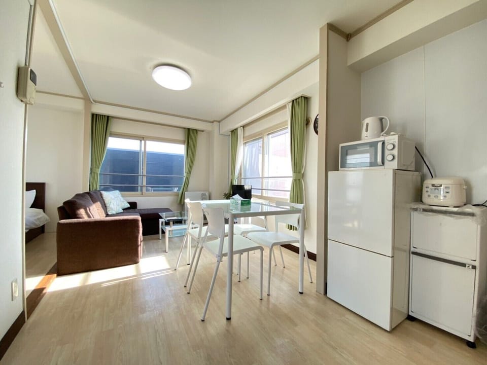 3 Bedrooms Apartment | Living area | Flat-screen TV