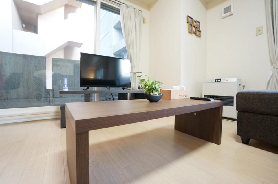 Apartment | Living area | Flat-screen TV