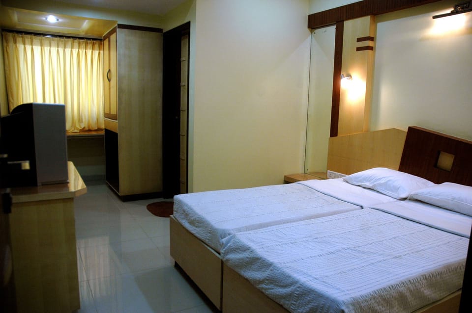 Standard Double Room | Desk, laptop workspace, blackout drapes, iron/ironing board