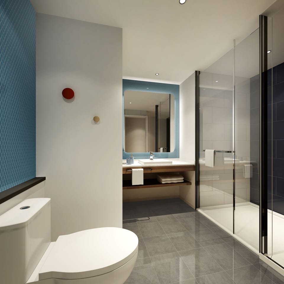 Shower, rainfall showerhead, free toiletries, hair dryer
