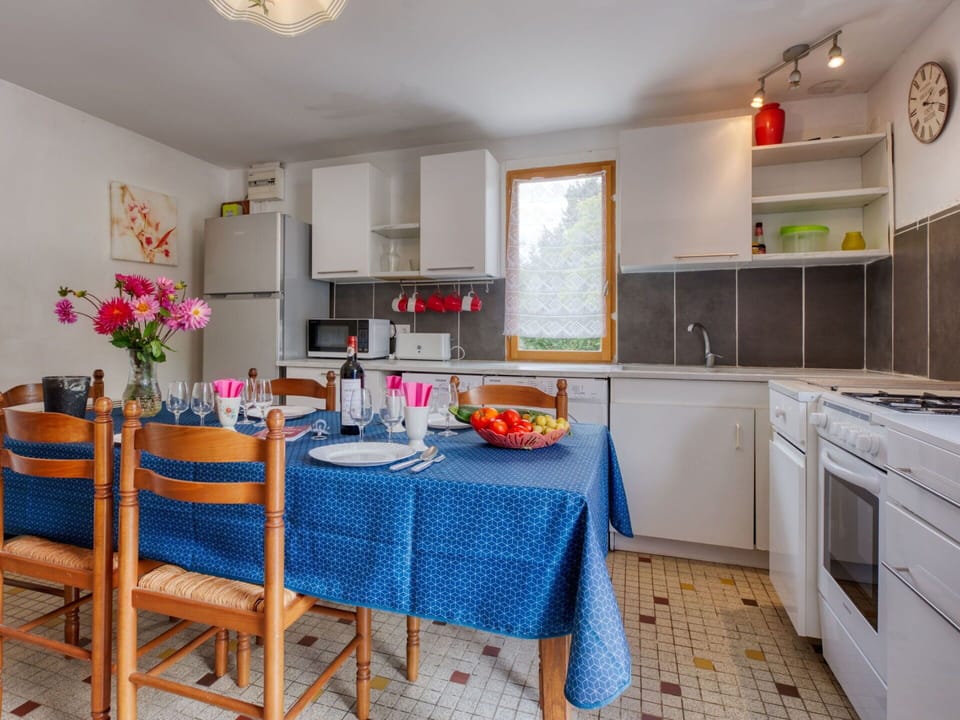 Property, Furniture, Cabinetry, Countertop, Table, Sink, Lighting, Flower, Interior Design, Floor