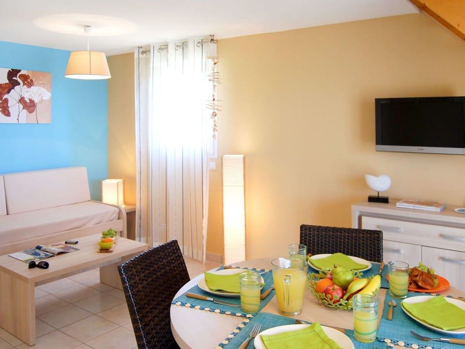 Room, Interior Design, Furniture, Green, Property, Yellow, Turquoise, Orange, Building, Table