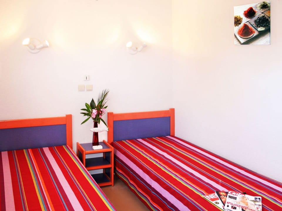 Room, Bedroom, Furniture, Bed, Red, Property, Interior Design, Orange, Wall, Bed Sheet