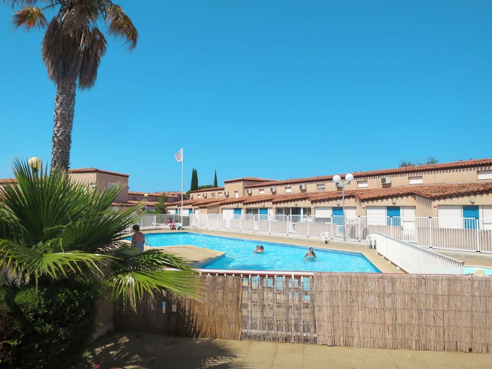 Water, Sky, Plant, Building, Swimming Pool, Azure, Tree, Body Of Water, Arecales, Leisure