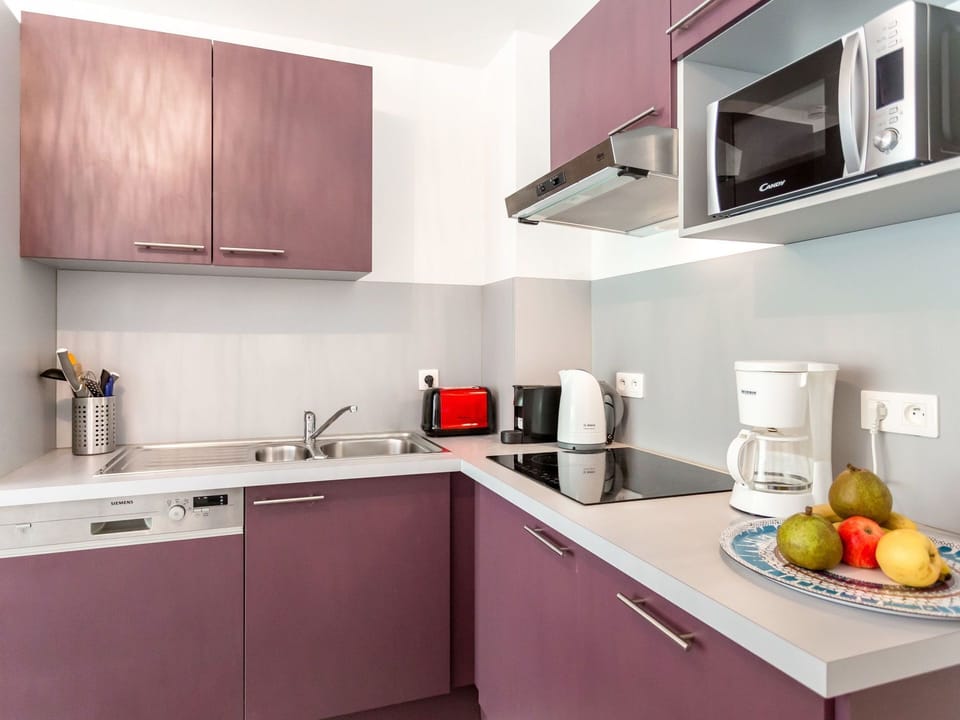 Countertop, Room, Kitchen, Cabinetry, Furniture, Property, Interior Design, Purple, Kitchen Stove, Tile
